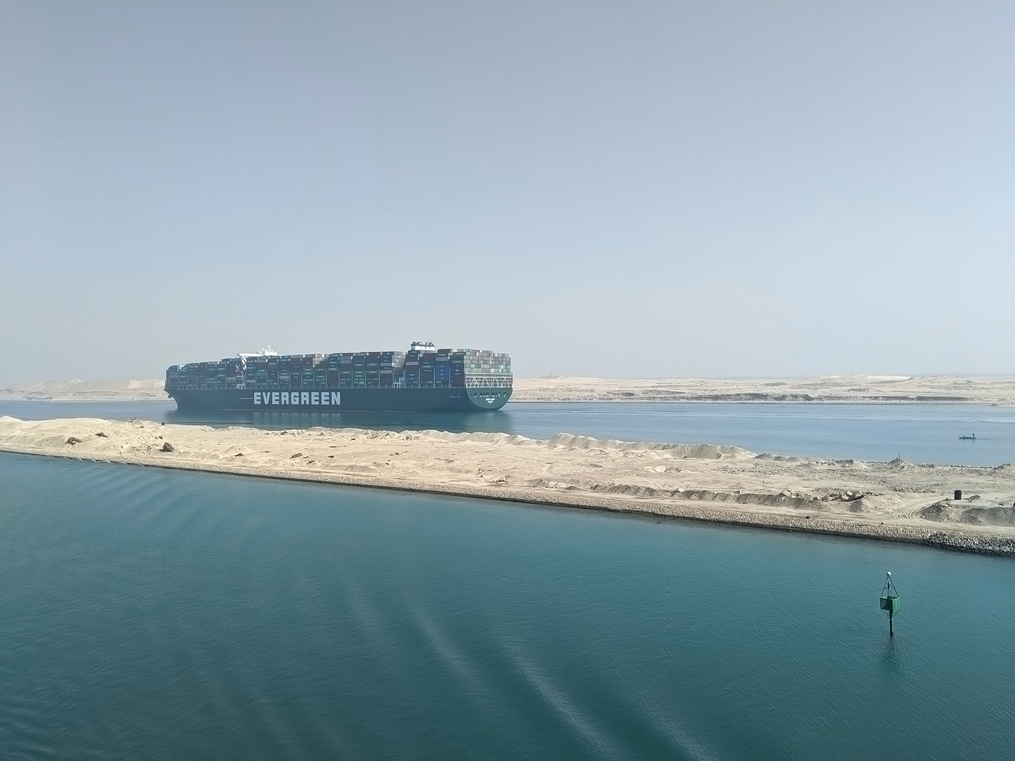 Cargo Vessel In Suez Canal Waterway Lane