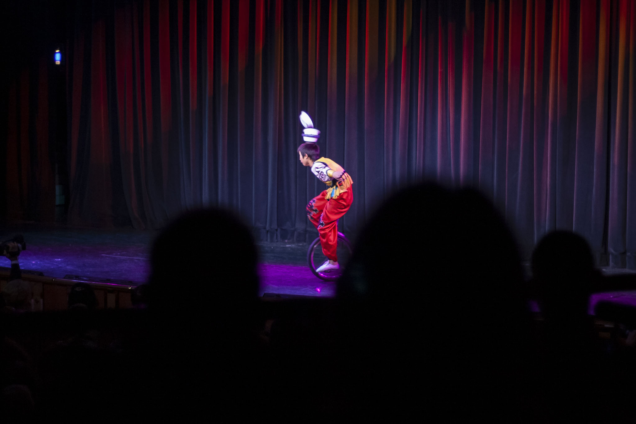 Unicyclist In Theatre