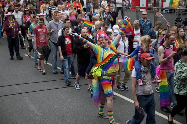 View of the Pride march walking along a street